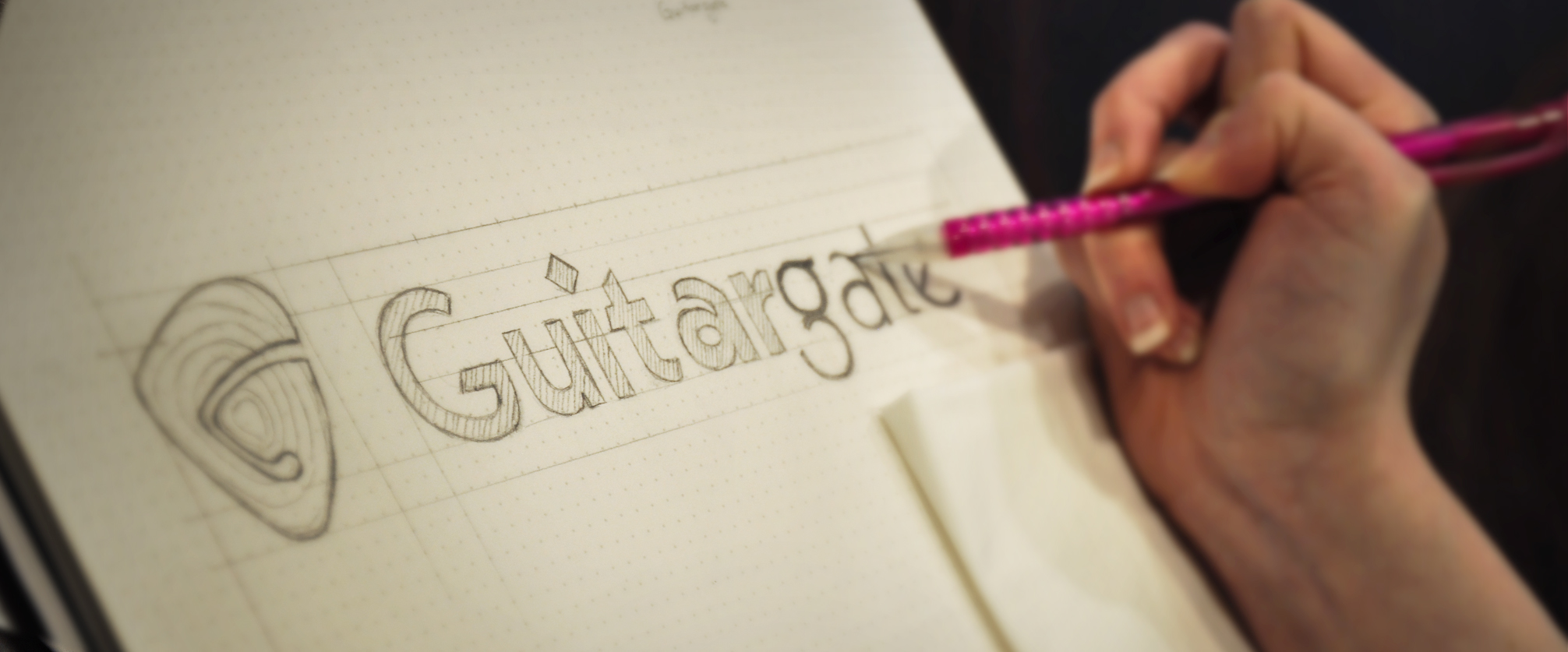 Sketch of logo and branding for Guitargate